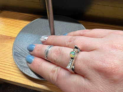 Sterling Silver Bar Ring with Opal and Yellow Gold Accents – size reference showing sterling silver bar ring with opal and yellow gold accents next to ruler, black background