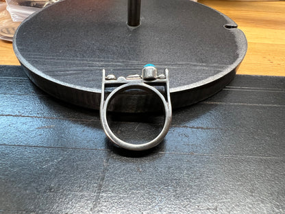 Sterling Silver Bar Ring with Turquoise and Rose Gold Accents – size reference showing sterling silver bar ring with turquoise and rose gold accents next to ruler, black background