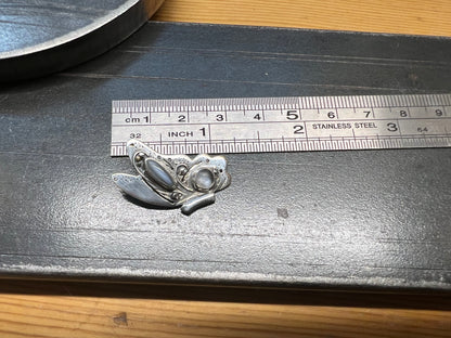 Sterling Silver Butterfly Pendant with Grey Moonstones – size reference showing sterling silver butterfly pendant with grey moonstones approximately 1.5 inches wide next to ruler, black background