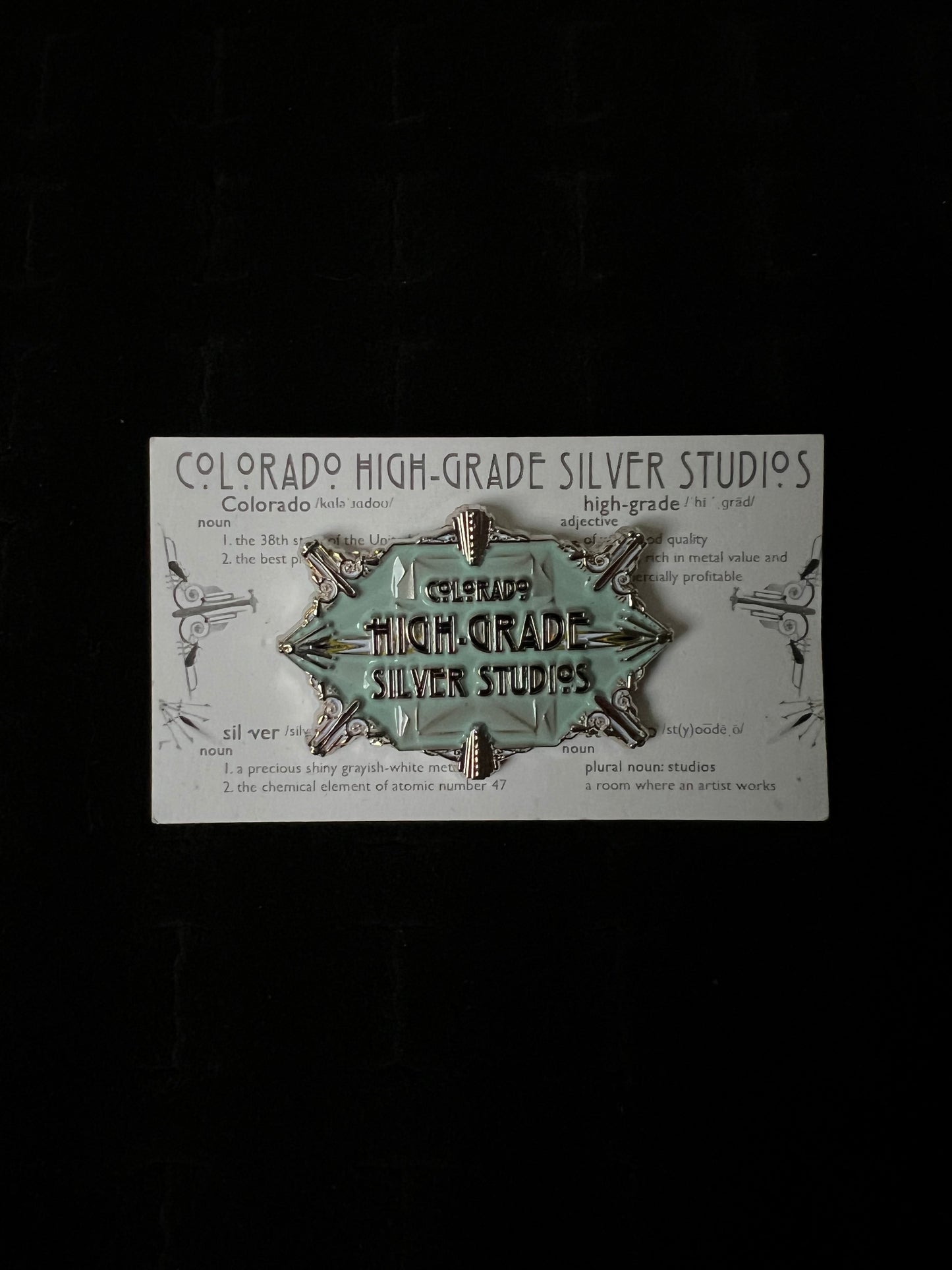 “Colorado High-Grade Silver Studios” enamel pin