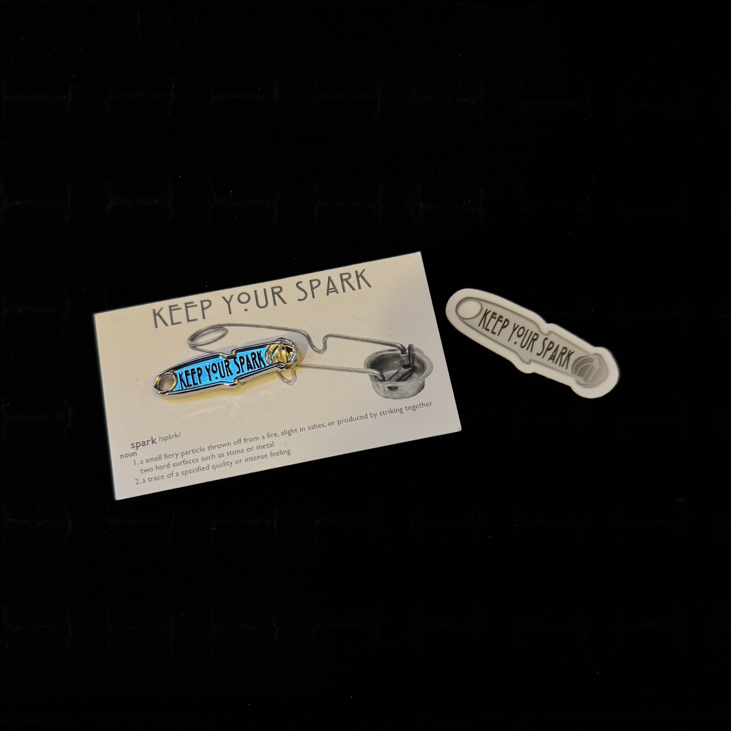 Keep Your Spark sticker – size reference of white vinyl torch sticker from The Tiny Smithery