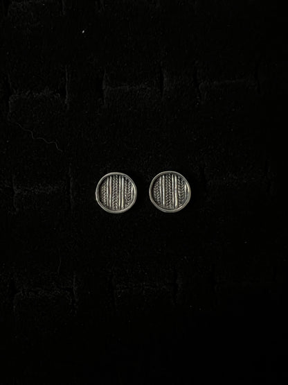 Medium Sweater Post Earrings – pair of handcrafted sterling silver round disc stud earrings with knit-texture pattern, black velvet background