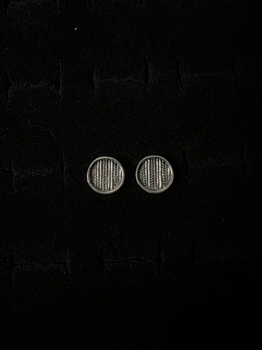 Medium Sweater Post Earrings – pair of handcrafted sterling silver round disc stud earrings with knit-texture pattern, black velvet background